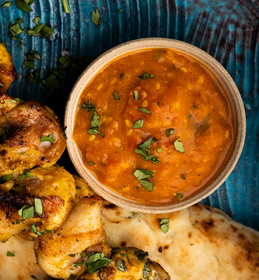 Ramekin of red achar, a Nepali sauce.