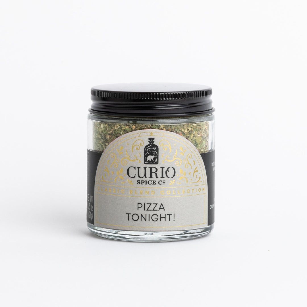 A glass jar of Curio Spice Co. &