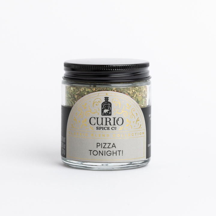 A glass jar of Curio Spice Co. &