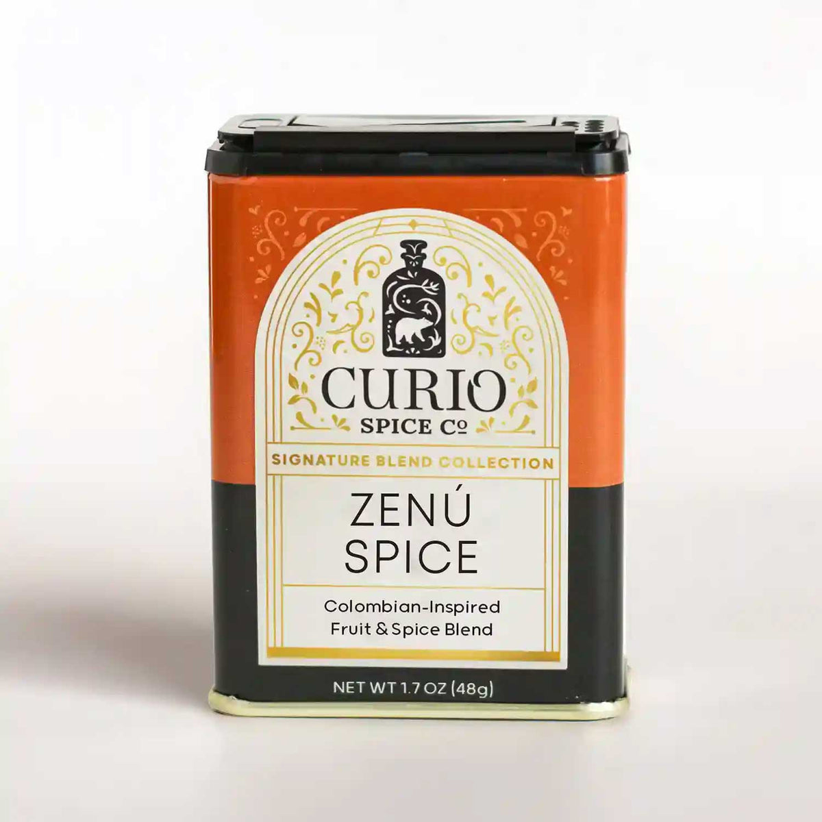 Orange and black tin of Zenú Spice, a Colombian-Inspired Fruit & Spice Blend from Curio's Signature Blend collection.