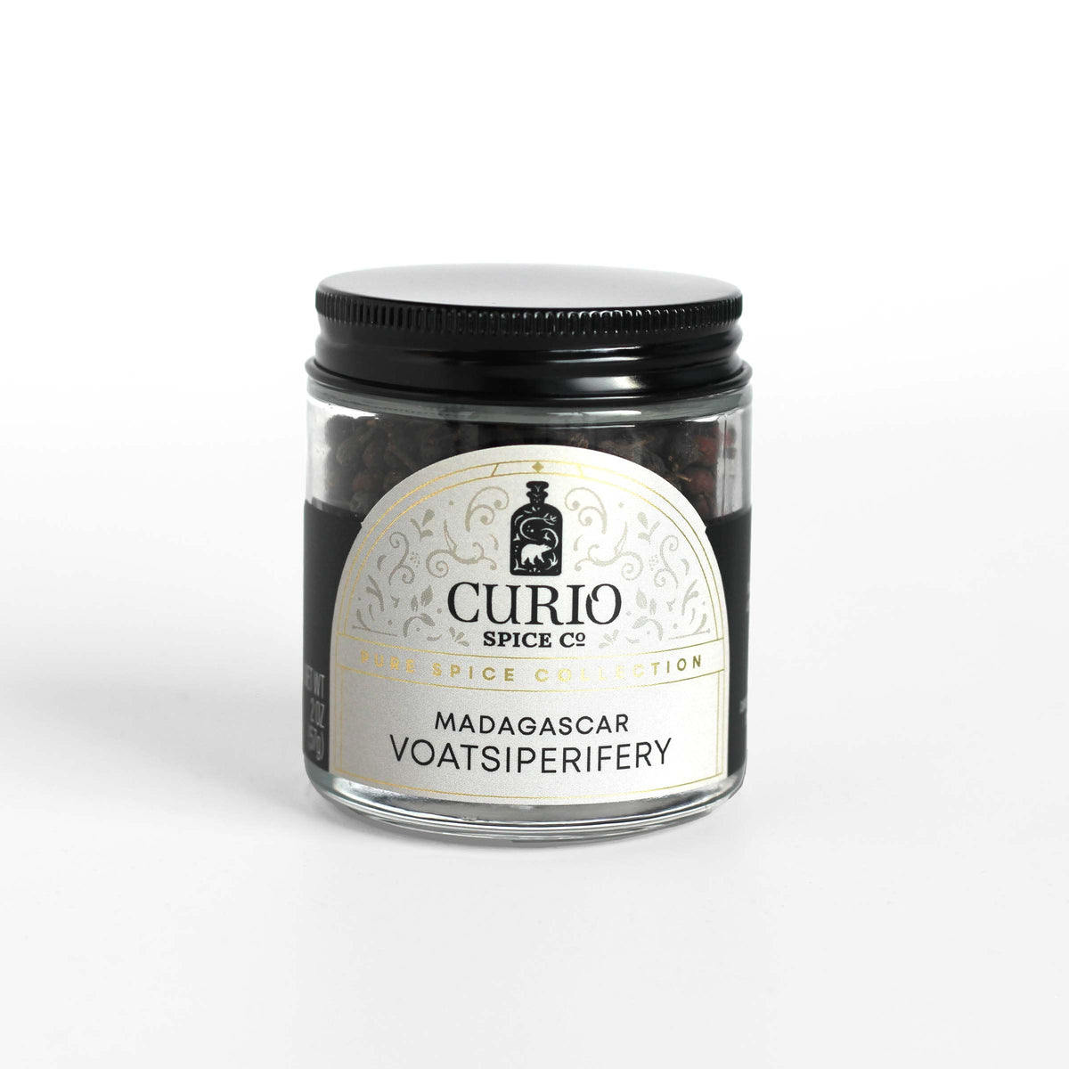 Curio Spice Co. fair-trade single origin sustainable Madagascar Voatsiperifery wild pepper in a glass jar.